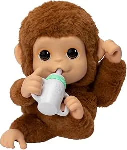 Little Live Pets My Baby Monkey Mono Mango com mais de 50 sons e reações. Com a sua boca móvel expressiva, come e chupa o dedo. Pendura-se das mãos e dos pés, como um macaco de verdade!